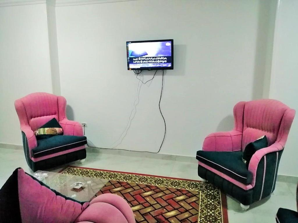 TV a/nebo společenská místnost v ubytování شقق موفينبيك هاوس 3