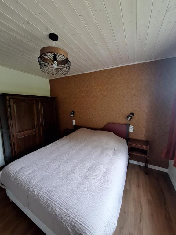 Postel nebo postele na pokoji v ubytování La Villa des Sources