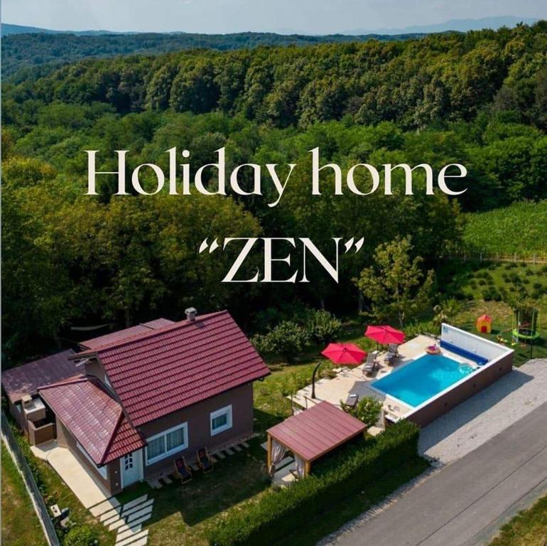 an aerial view of a house with a swimming pool at Holiday home ZEN in Vinkovac