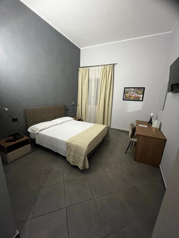 Postel nebo postele na pokoji v ubytování Hotel Saturday