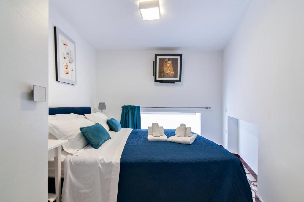 A bed or beds in a room at Dimora Vico Storella