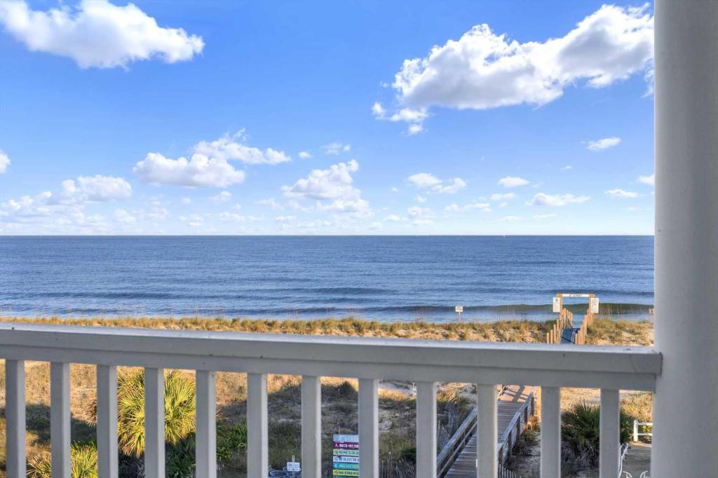 a view of the ocean from a balcony at Oceanview on Tybee 202-3 in Tybee Island
