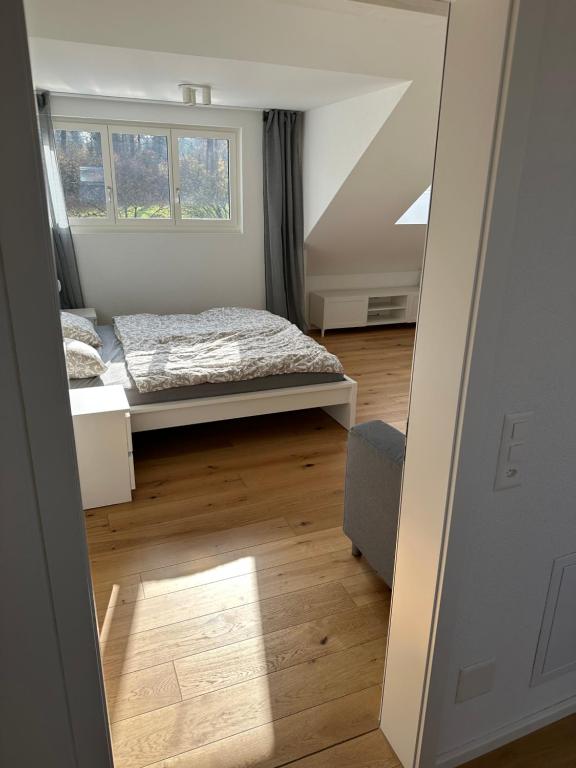 Postel nebo postele na pokoji v ubytování Ferienhaus an der Schwarz ZH