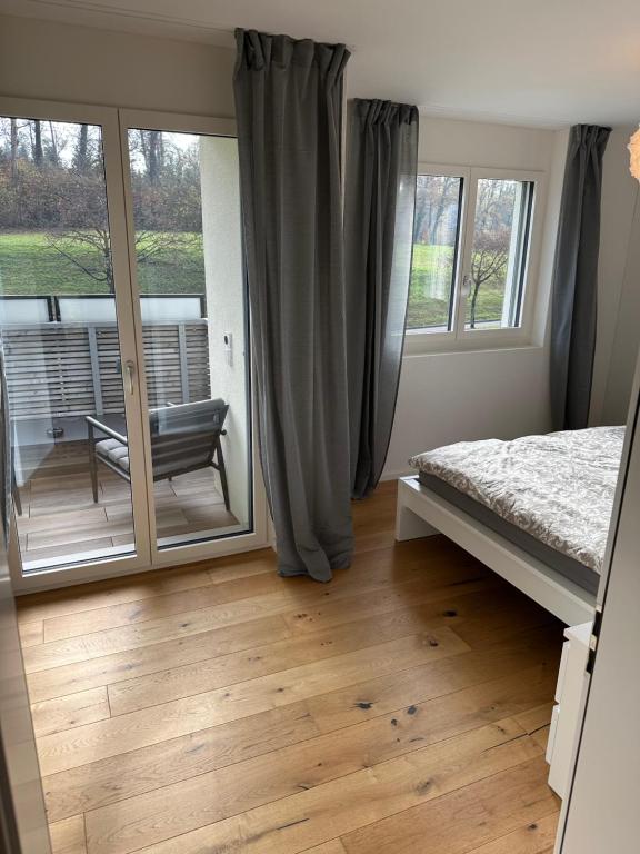 Postel nebo postele na pokoji v ubytování Ferienhaus an der Schwarz ZH