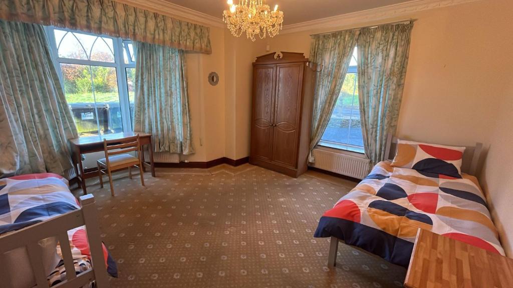 Ένα ή περισσότερα κρεβάτια σε δωμάτιο στο Scartagh House, Scartagh, Clonakilty