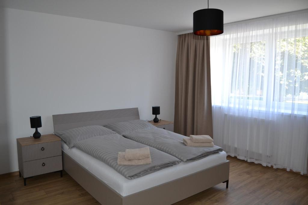 Postel nebo postele na pokoji v ubytování Ubytovanie pod Vršatcom