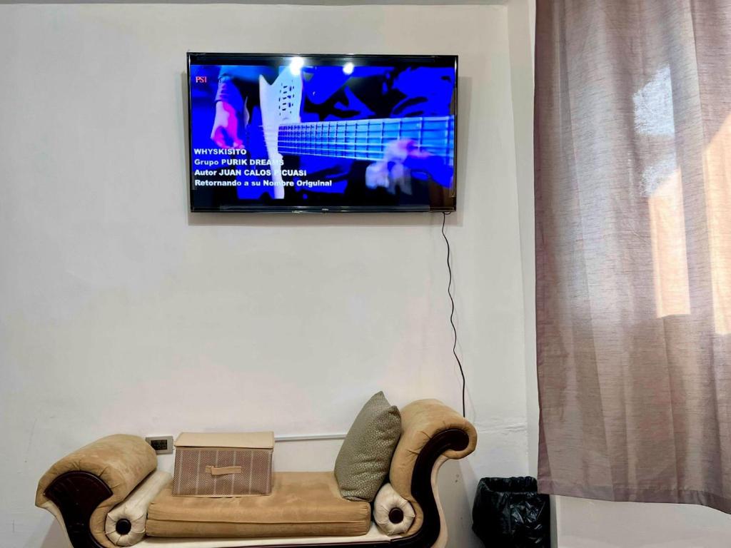 TV a/nebo společenská místnost v ubytování Suite Deluxe - 4 min Consulado Americano