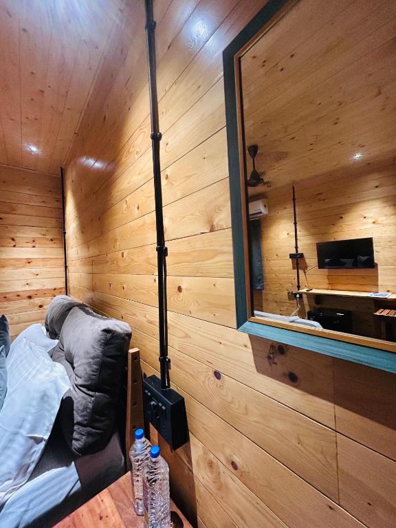 TV a/nebo společenská místnost v ubytování Seclude Eco Cottages