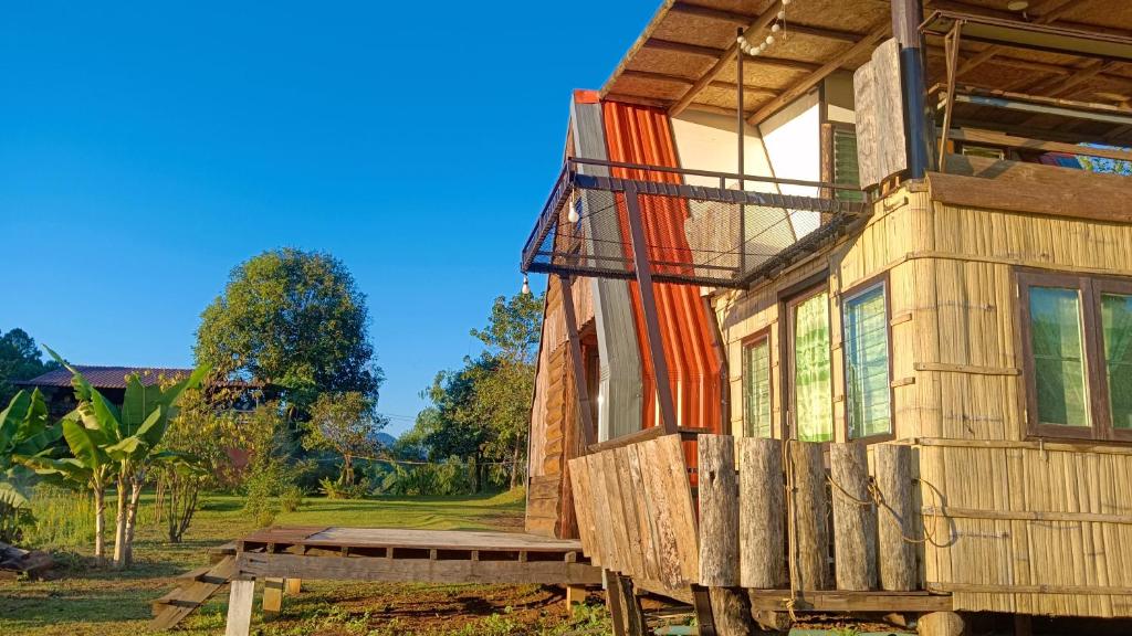 Balkón nebo terasa v ubytování ไร่นิธิสุนทร nithisoonthon farmstay