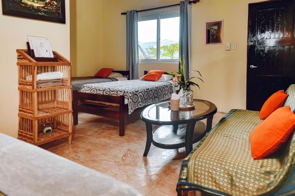 Postel nebo postele na pokoji v ubytování Hotel Anachoreo