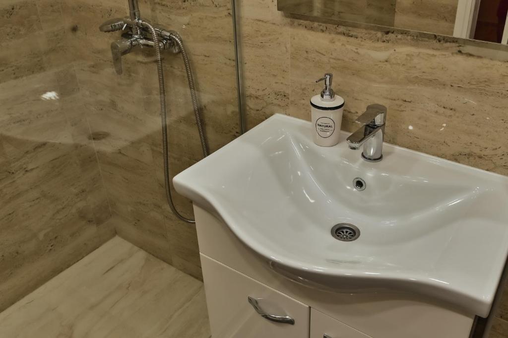 Koupelna v ubytování Level 1 Spa Apartman