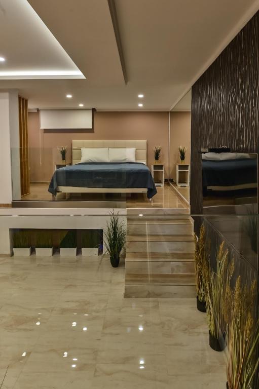 Postel nebo postele na pokoji v ubytování Level 1 Spa Apartman