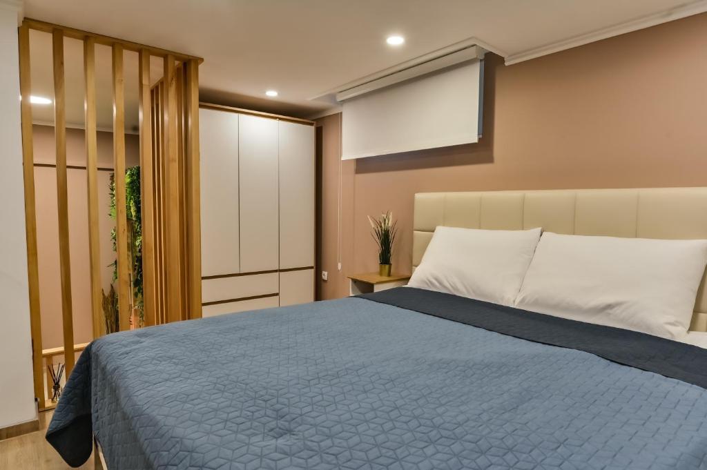 Postel nebo postele na pokoji v ubytování Level 1 Spa Apartman