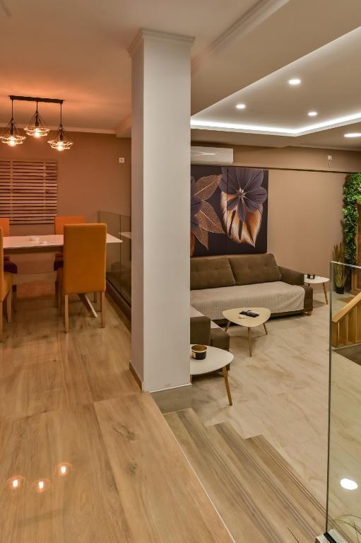 Posezení v ubytování Level 1 Spa Apartman
