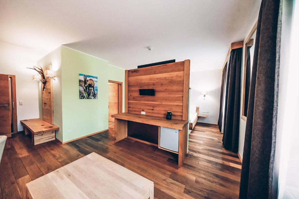 Postel nebo postele na pokoji v ubytování Aktivhotel Wildschütz