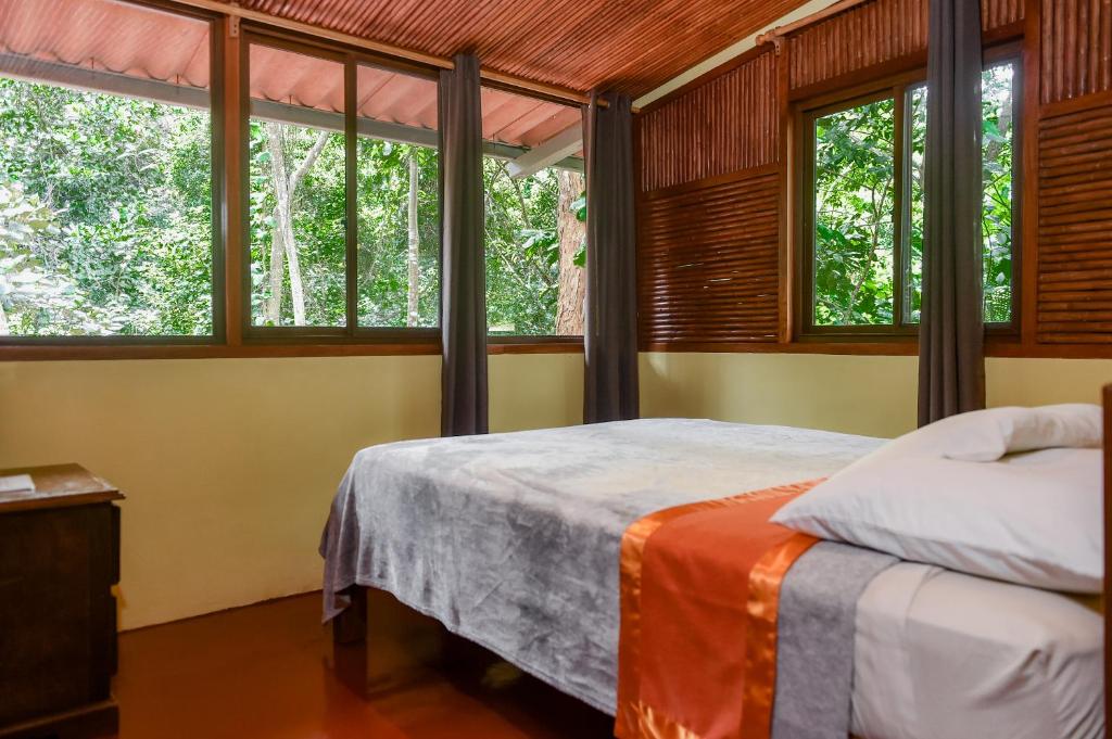 Postel nebo postele na pokoji v ubytování Hotel Anachoreo