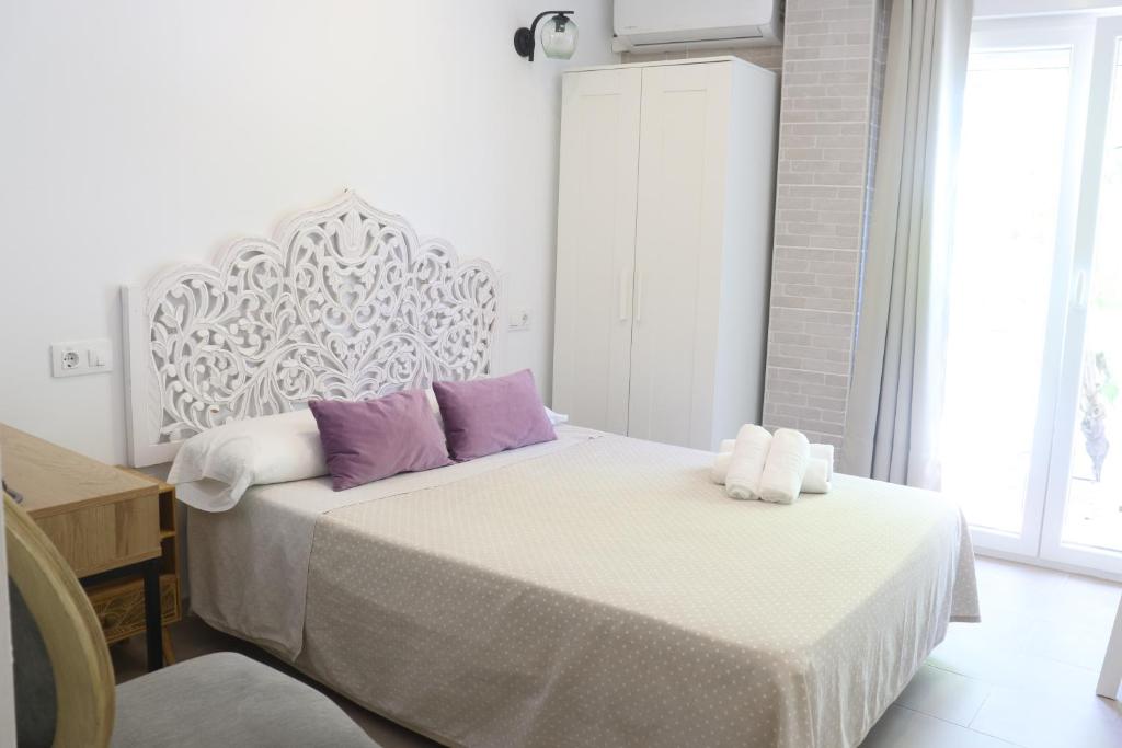 Postel nebo postele na pokoji v ubytování Hotel CALPE