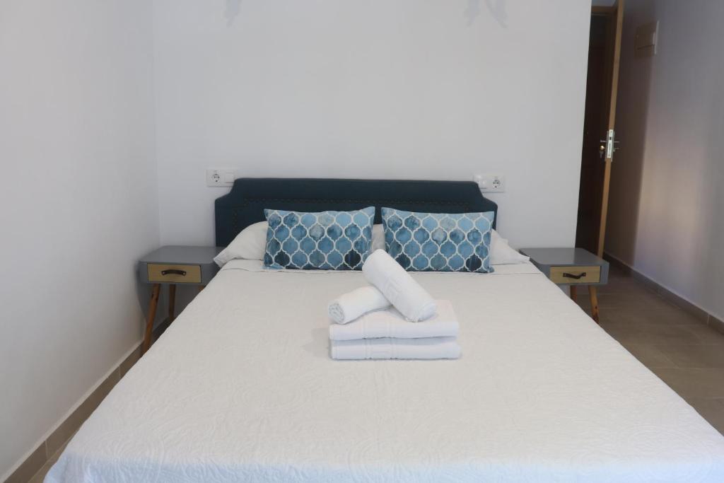 Postel nebo postele na pokoji v ubytování Hotel CALPE