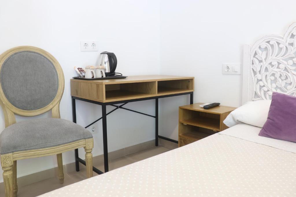 Postel nebo postele na pokoji v ubytování Hotel CALPE