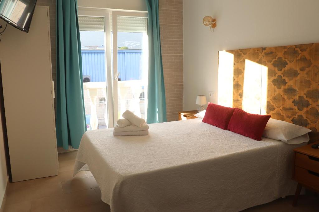 Postel nebo postele na pokoji v ubytování Hotel CALPE
