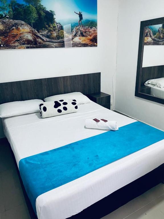 Postel nebo postele na pokoji v ubytování Hotel Jardin de Laureles Jeps
