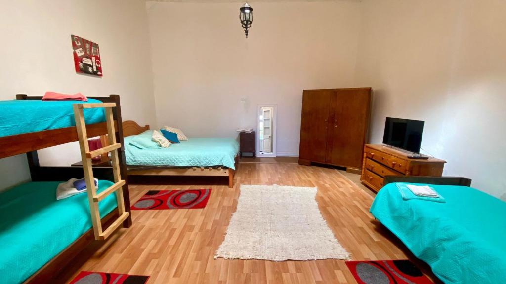 Postel nebo postele na pokoji v ubytování Hotel Dolegant