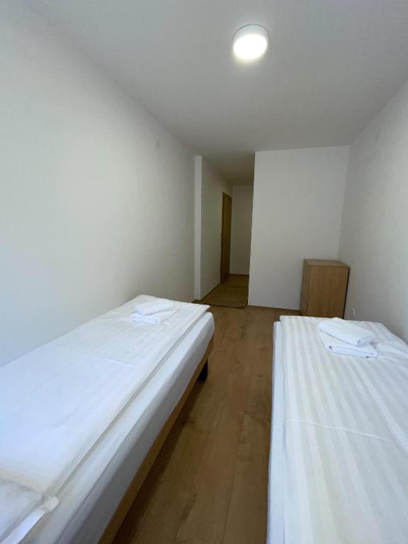 Postel nebo postele na pokoji v ubytování Lux Snowflake Poljice Jahorina