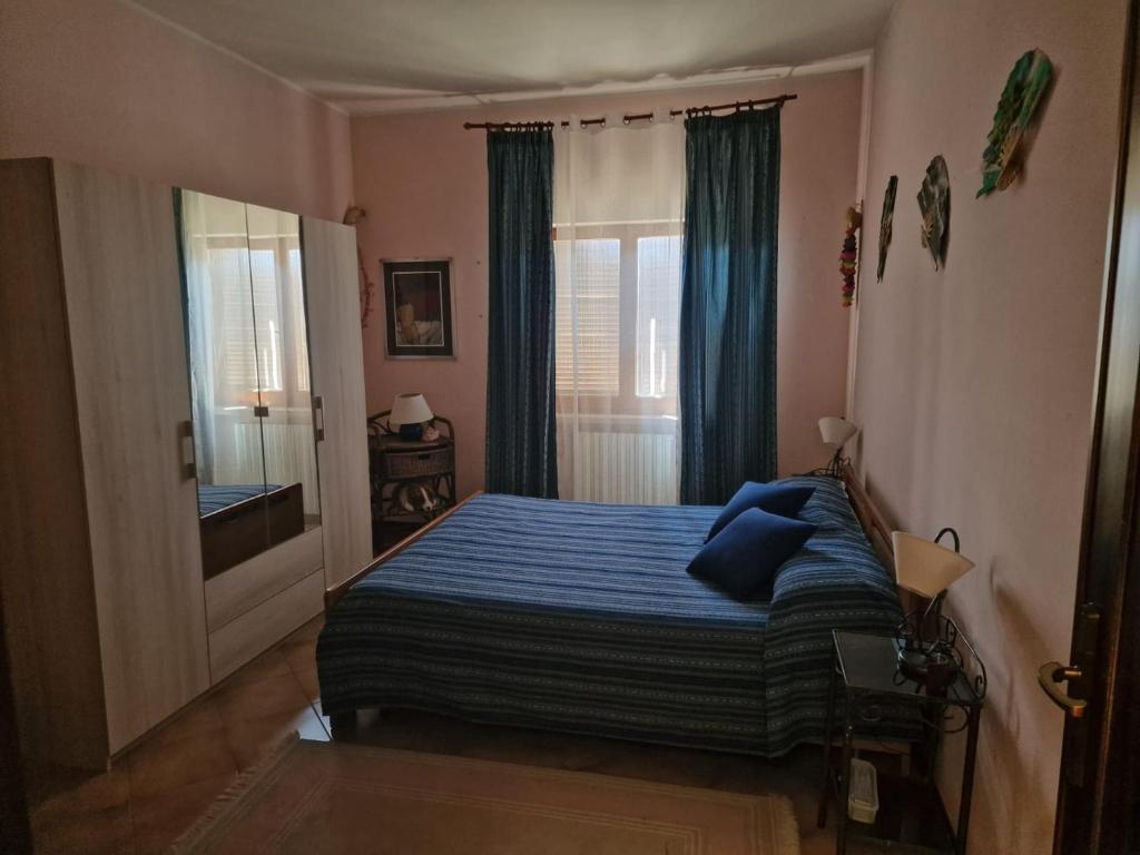 Ένα ή περισσότερα κρεβάτια σε δωμάτιο στο B&B A Casa di Anna