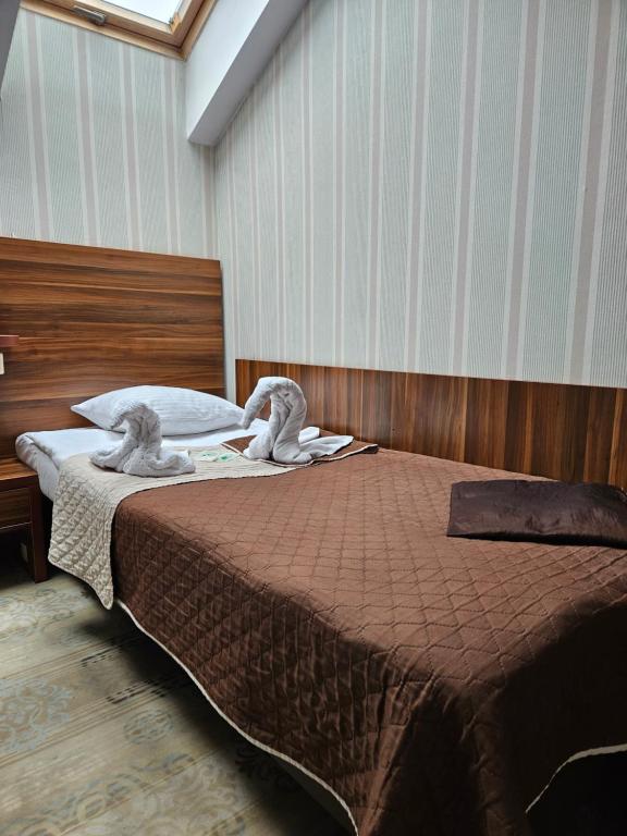 Postel nebo postele na pokoji v ubytování Gościniec Jurajski