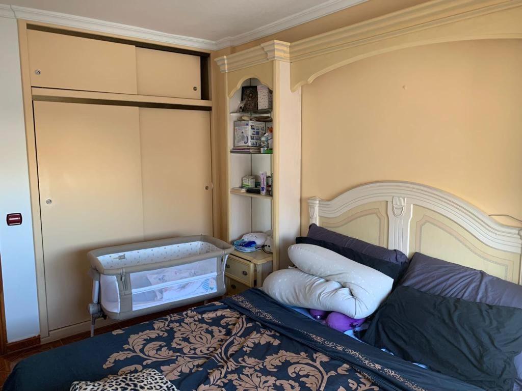 Postel nebo postele na pokoji v ubytování ArYa