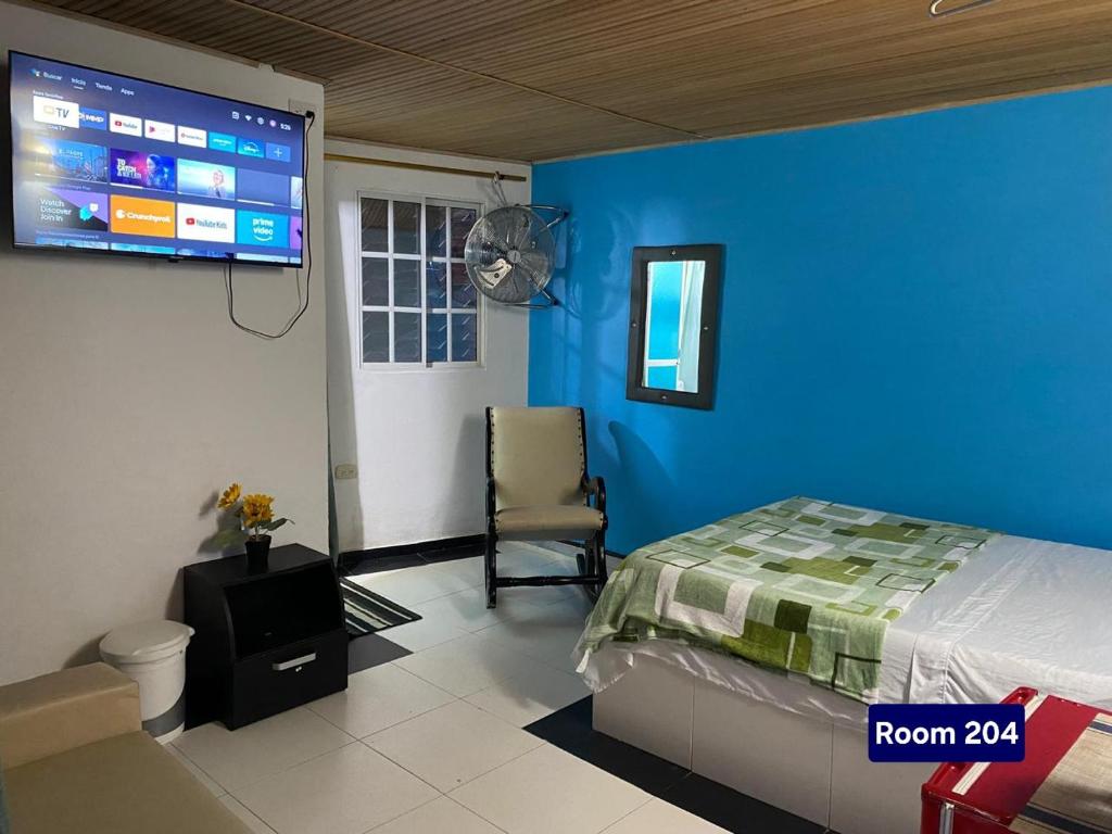 TV a/nebo společenská místnost v ubytování Hotel Minca Express Relax - Base Camp