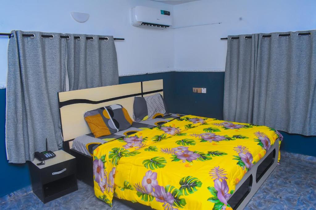 Postel nebo postele na pokoji v ubytování De Empire Hotel