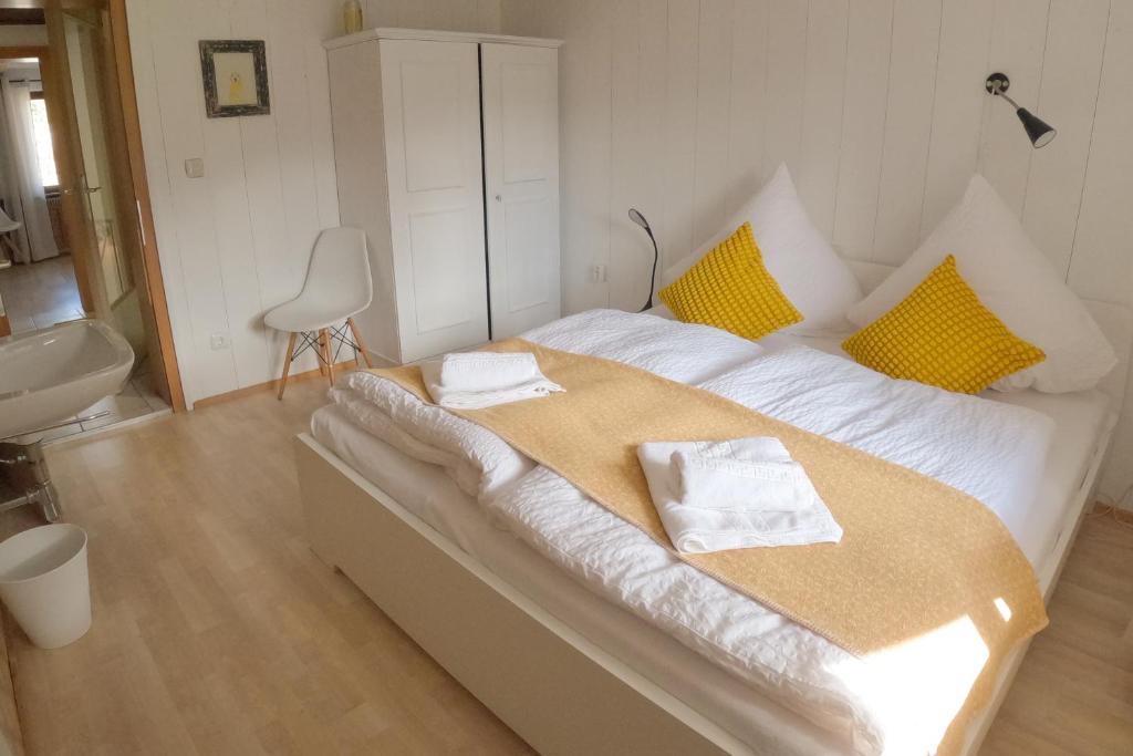 Postel nebo postele na pokoji v ubytování Sonnes Apartment