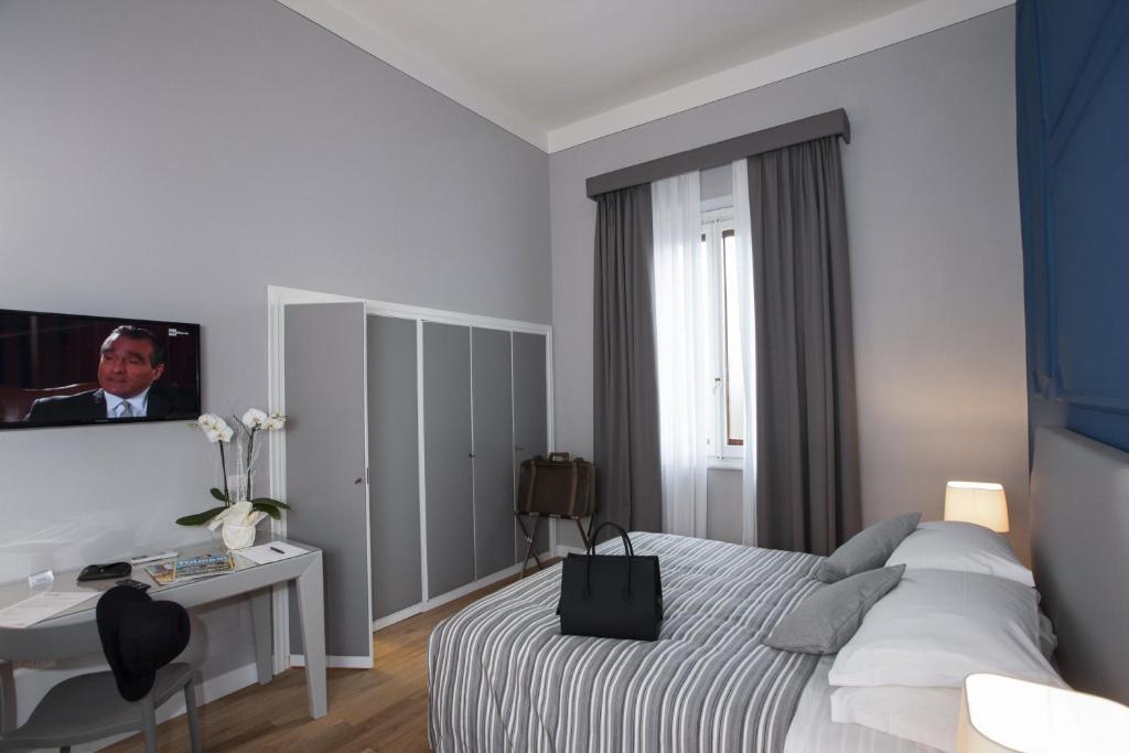 Postel nebo postele na pokoji v ubytování Hotel Il Sole