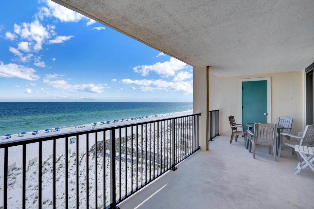 a balcony with a view of the beach at Wind Drift 501 by Vacation Homes Collection in Orange Beach