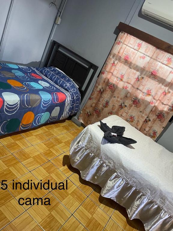 Postel nebo postele na pokoji v ubytování Managua Hotel Oasis