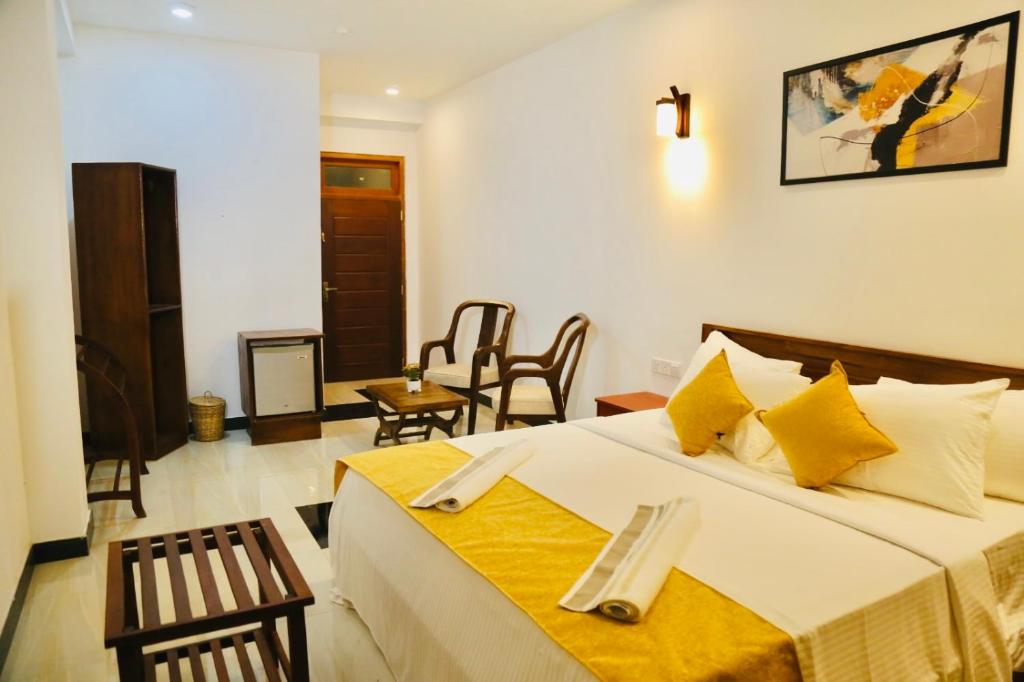 Ένα ή περισσότερα κρεβάτια σε δωμάτιο στο Avon Hills Ella Resort