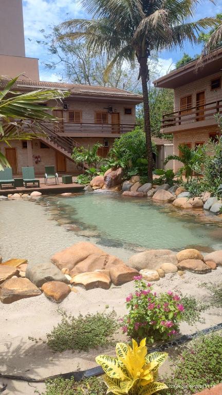 Bazén v ubytování Hotel Pousada Santa Rita nebo v jeho okolí