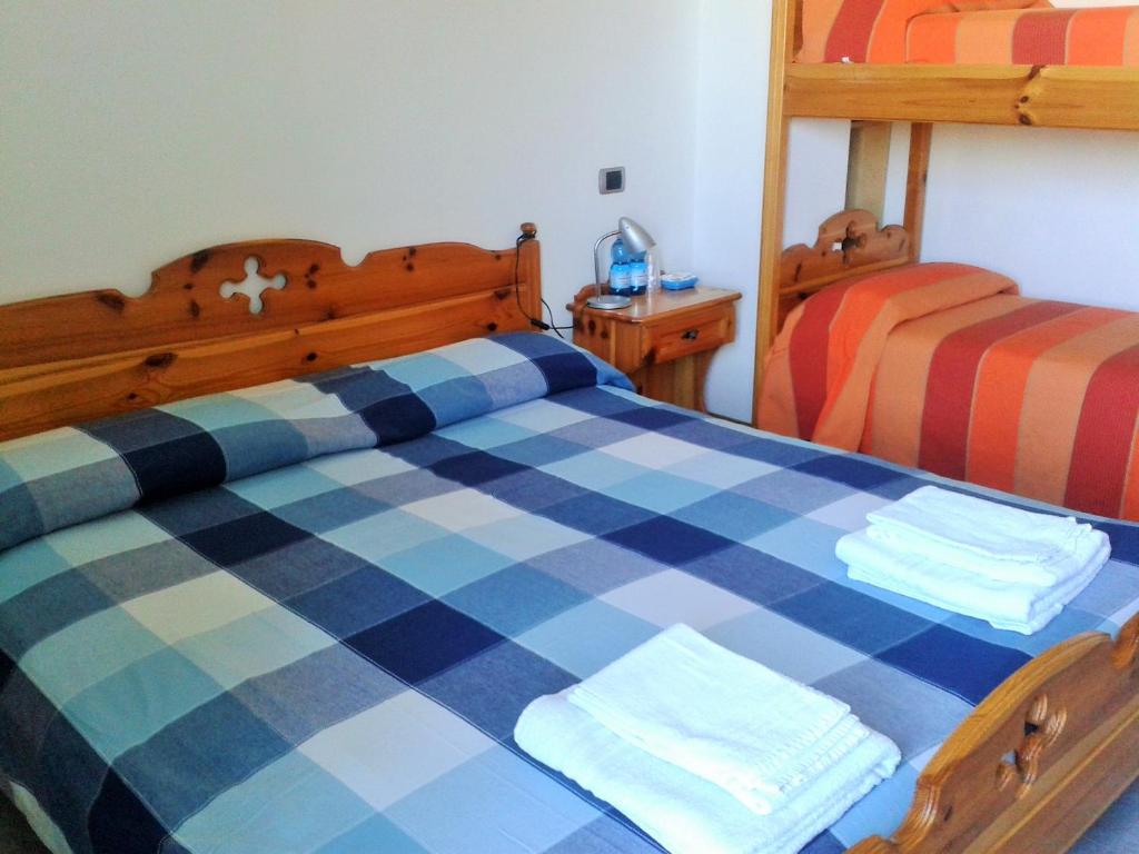 Postel nebo postele na pokoji v ubytování B&B La Salina