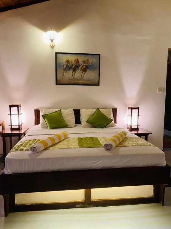 Postel nebo postele na pokoji v ubytování Kings Rest Sigiriya