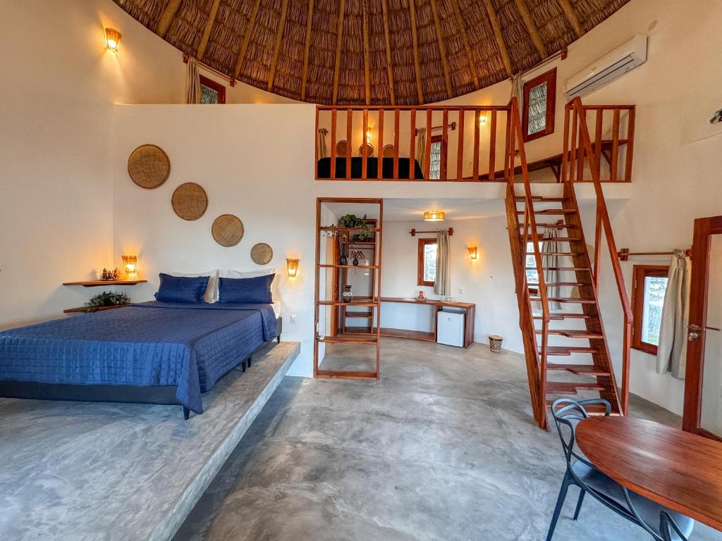 Postel nebo postele na pokoji v ubytování VentoVinte Beach Club