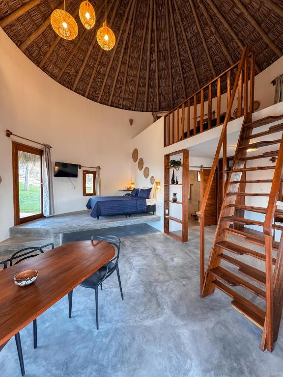 Postel nebo postele na pokoji v ubytování VentoVinte Beach Club