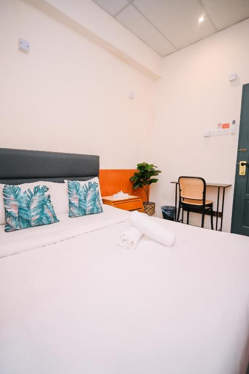 Area soggiorno di Swing & Pillows - 75 Chulia St, Georgetown Penang
