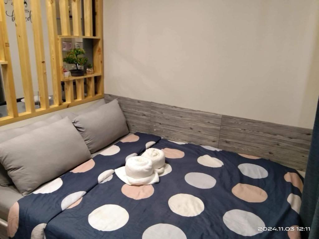 Ένα ή περισσότερα κρεβάτια σε δωμάτιο στο Alex's Staycation