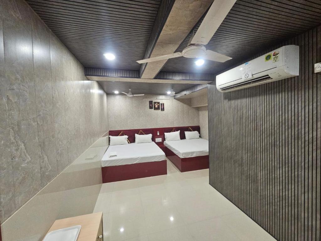 Postel nebo postele na pokoji v ubytování Hotel Bleue Mont