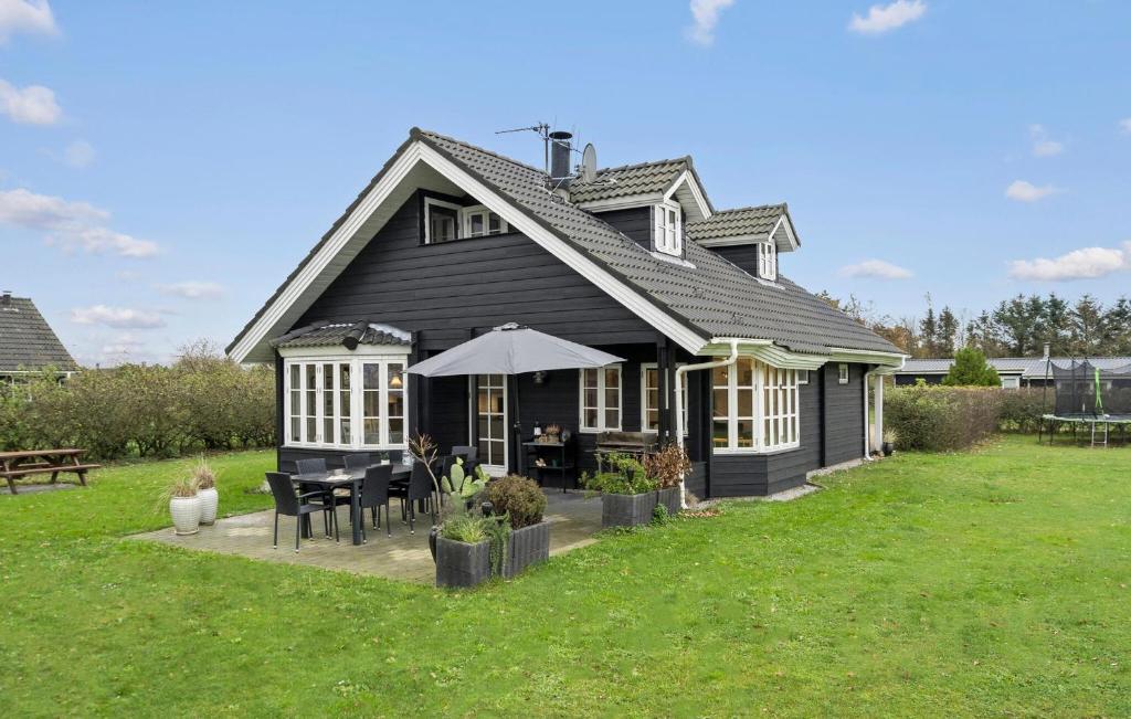 Zahrada ubytování Holiday Home Tyttebærvej Tarm Iv