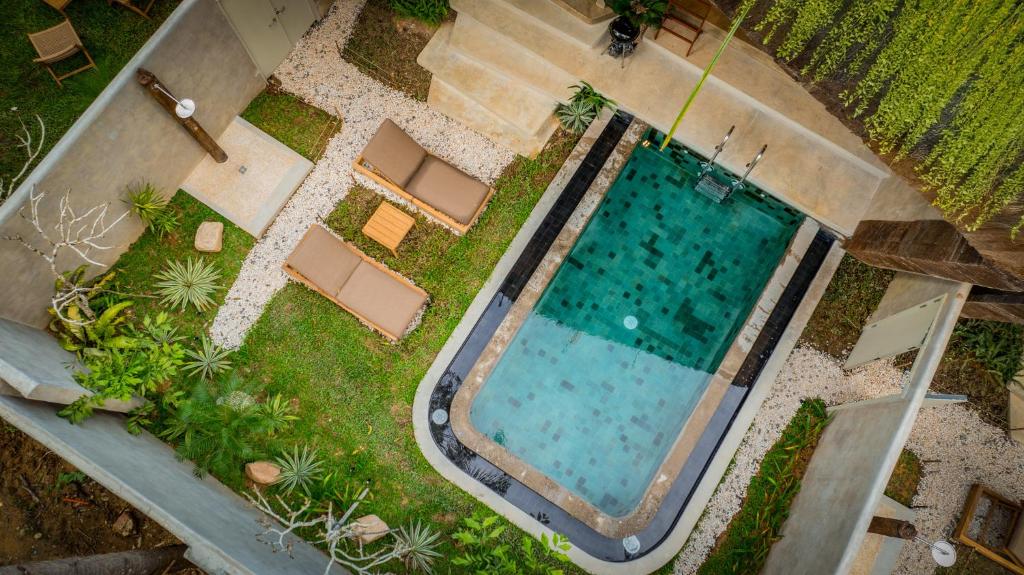 Bazén v ubytování Diwatu Villas nebo v jeho okolí