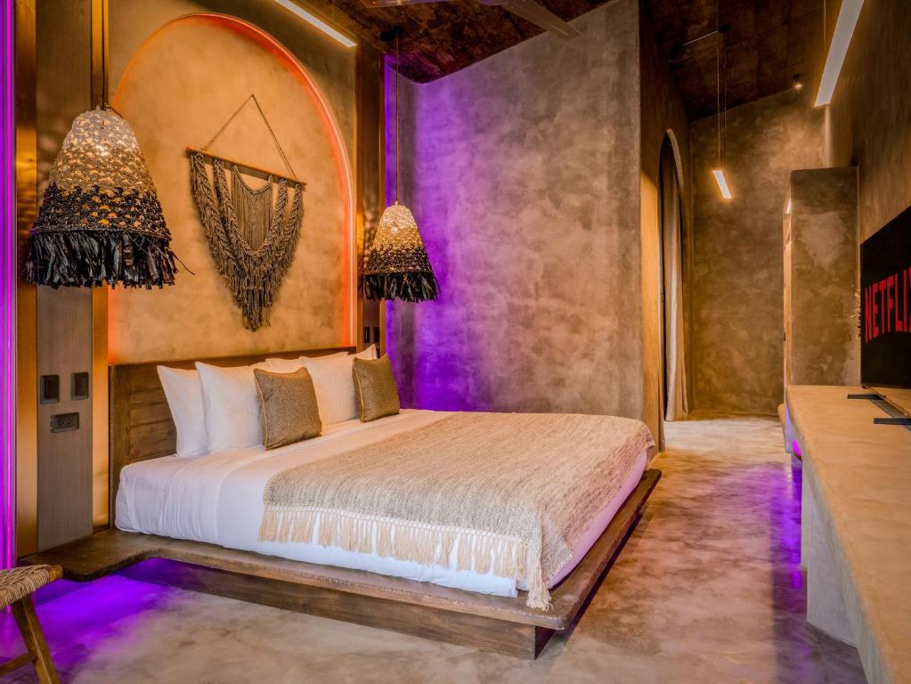 Postel nebo postele na pokoji v ubytování Diwatu Villas