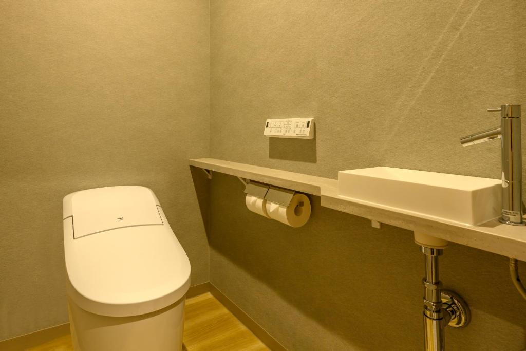 Koupelna v ubytování ART HOTEL Nippori Lungwood