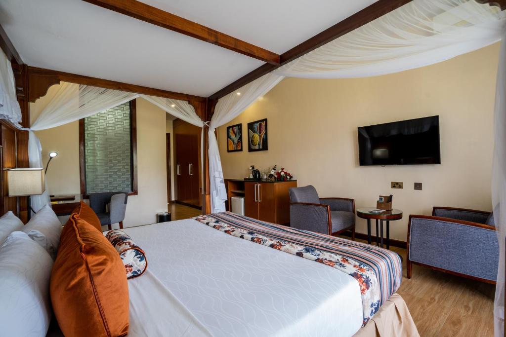 TV a/nebo společenská místnost v ubytování Ciala Resort Hotels In Kisumu